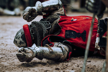 Warrior from Buhurt league fallen to the ground