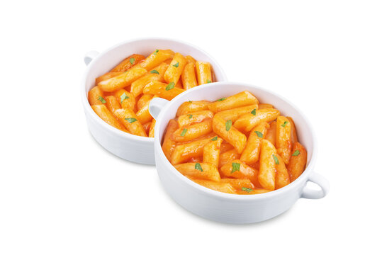 Tteokbokki. Traditional korean rice sticks in hot spicy sauce on a white isolated background