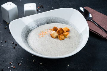 Champignon cream soup with croutons.