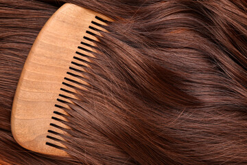 Brown hair with comb, closeup