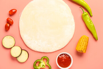 Raw dough and ingredients for preparing vegetable pie on pink background