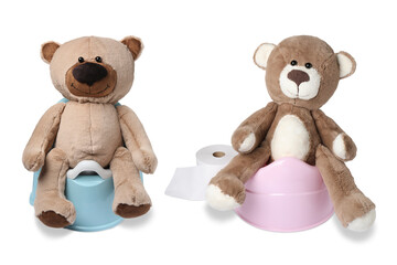 Baby potties with toy bears and toilet paper isolated on white