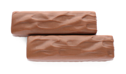 Tasty chocolate bars on white background, top view