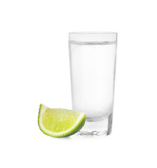 Fototapeta na wymiar Shot of vodka with lime slice on white background