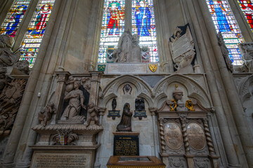 Obraz premium Monument in Westminster Abbey with Gothic style is located next to Palace of Westminster in city of Westminster in London, UK. This church is UNESCO World Heritage Site. 