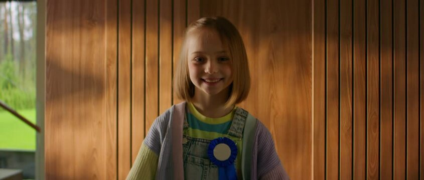 Portrait of happy cute Caucasian girl posing with her science class volcano project, won the first place for best build Generative AI