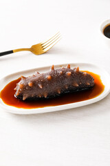 Closeup shot of sea cucumbers on the table, delicious seafood(Stichopus japonicus)