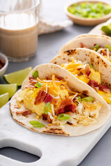 Breakfast tacos with hash browns, eggs and bacon