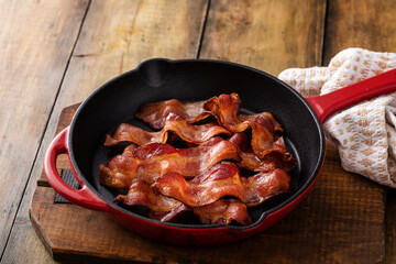 Cooked bacon in a cast iron pan