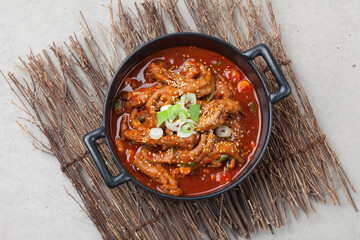 Chicken feet seasoned with vegetables.