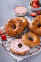 Variety of bagels served with strawberry cream chees and fresh berries