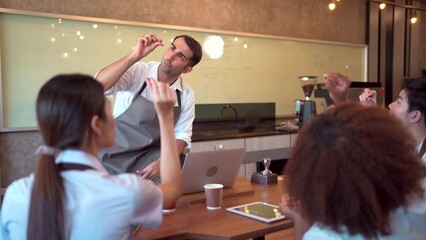 Group of barista or bartender students having a workshop how to brew and test coffee with professional - expert barista.