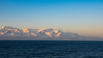 beautiful natural snowy mountainscape with horizon. scenery and peaceful mountainscape