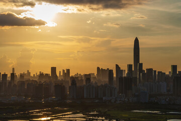 Silhouette of skyline of Shenzhen city, China under sunset. Viewed from Hong Kong border