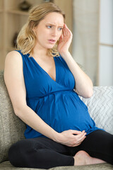 Obraz premium pregnant woman with a headache