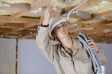 a female electrician at work