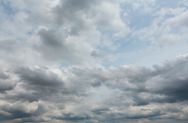 Fototapeta na wymiar A stormy sky full of gray clouds . The sky before the rain.