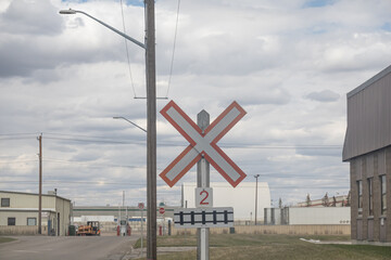 Railway Crossing sign on industrial area road