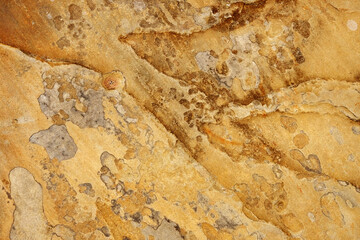 texture of a stone wall with cracks, background and a shadow
