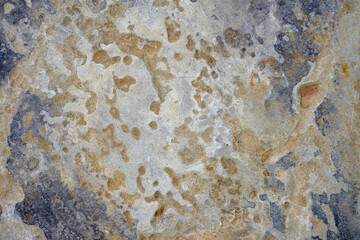 texture of a stone wall with cracks, background and a shadow