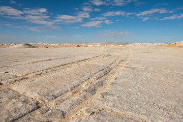 Barren desert landscape in hot climate with chalk rock formation