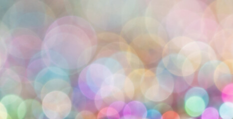 Multicolored festive bokeh as background.