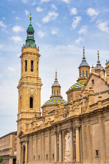 Christian Cathedral of the Basilica del Pilar with its high Mudejar style towers, Zaragoza, Spain.