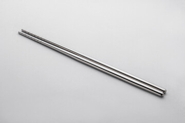 Stainless steel tableware and kitchen utensils placed on the desktop