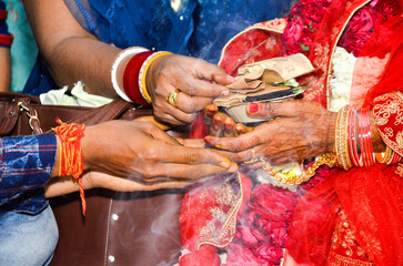 henna painting on hands