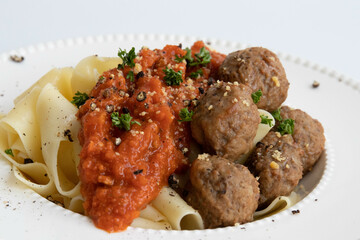 Close up Traditional Italian food, Italian Pasta ,  Pappardelle , Bolognese with Meat Balls 