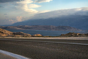 An asphalt road running past a beautiful viewpoint on the Island of Pag,Croatia.