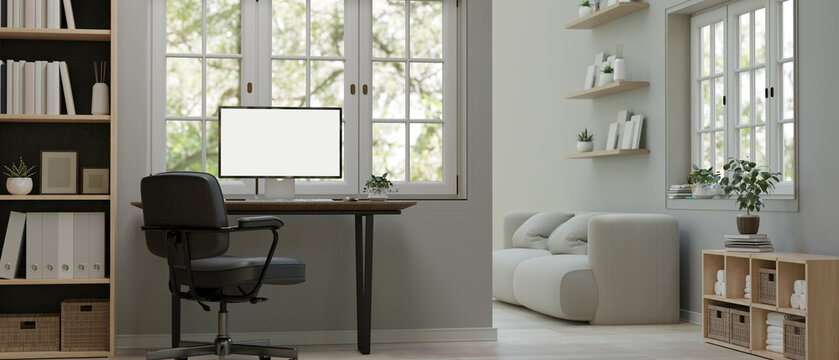 Minimal white home working space interior design with computer mockup on a table