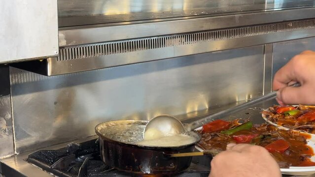 Melting butter in pan. The master melting butter for Iskender kebab