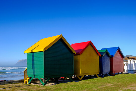 South Africa, Western Cape Province, Cape Town, Row of colorful beach huts at Muizenberg Beach
