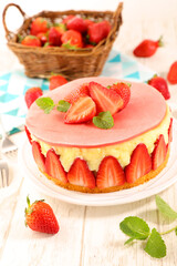 French strawberry cake Fraisier on wood background