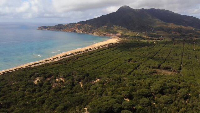 4k aerial view of beach of San Nicolo' in Buggerru, Sardinia, establishing