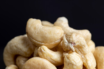 Fresh peeled cashew nuts on the table