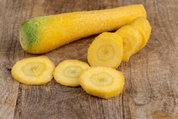 Pieces of sliced peeled carrots are yellow