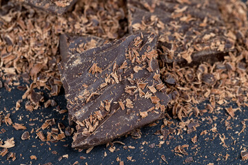 a crumbled piece of bitter chocolate into small pieces
