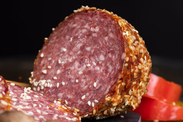 fresh sausage with sesame seeds and aromatic spices