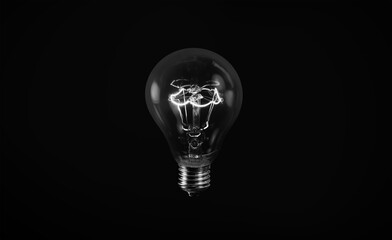Electric bulb Black and White lamp with a spiral on a black background