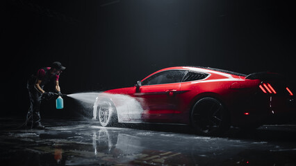 Professional Car Wash Specialist Applying Smart Foam to Prepare a Modern Red Sportscar with Retro...