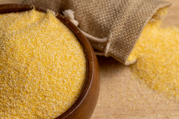 Dry corn flour poured into a linen bag for making porridge