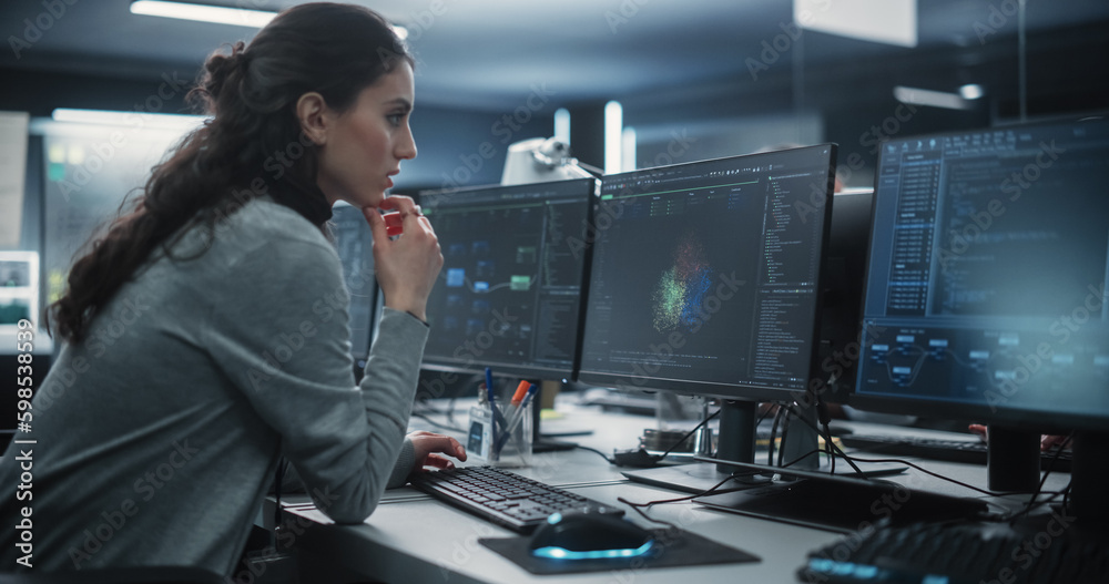 Aufkleber Portrait of a Thoughtful Young Engineer Working on Computer in a Technological Office Environment. Beautiful Multiethnic Woman Writing Software Code for a Blockchain Project