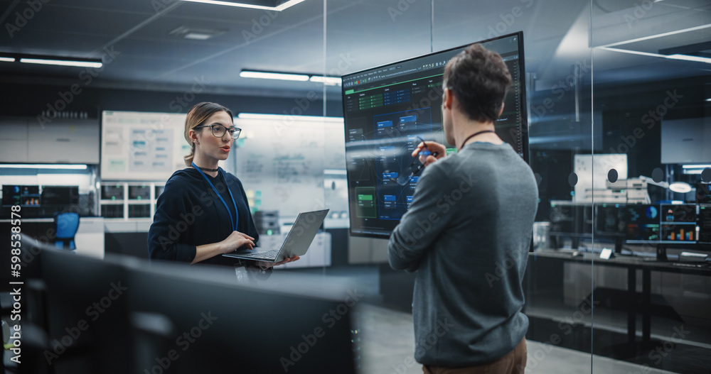 Aufkleber Two Diverse Software Developers Having a Meeting in a Conference Room. Female and Male Tech Industry Engineers Brainstorming Ideas for Their Neural Network Blockchain Startup