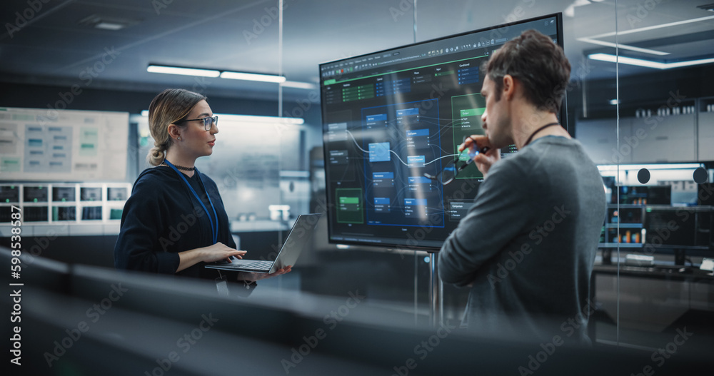 Poster Two Diverse Software Developers Having a Meeting in a Conference Room. Female and Male Tech Industry Engineers Brainstorming Ideas for Their Neural Network Blockchain Startup