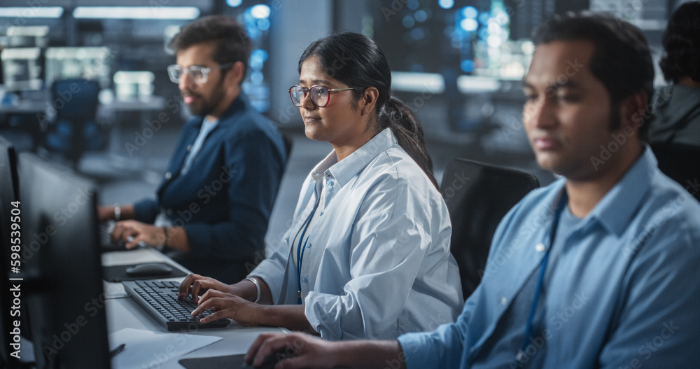 Fototapete Group of Empowered Multicultural Men and Women Working in a Research Center, Using Computers to Run Advanced Software, Develop Artificial Intelligence Interface and Neural Network Blockchain