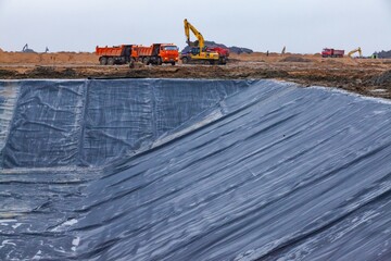 Ust-Luga, Leningrad oblast, Russia - November 16, 2021: Construction of chemical waste ditch (on...