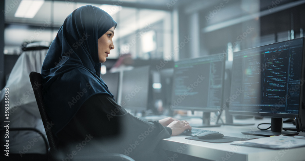 Aufkleber portrait of a thoughtful middle eastern female working on computer in a technological corporate offi