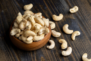 Fresh peeled cashew nuts on the table